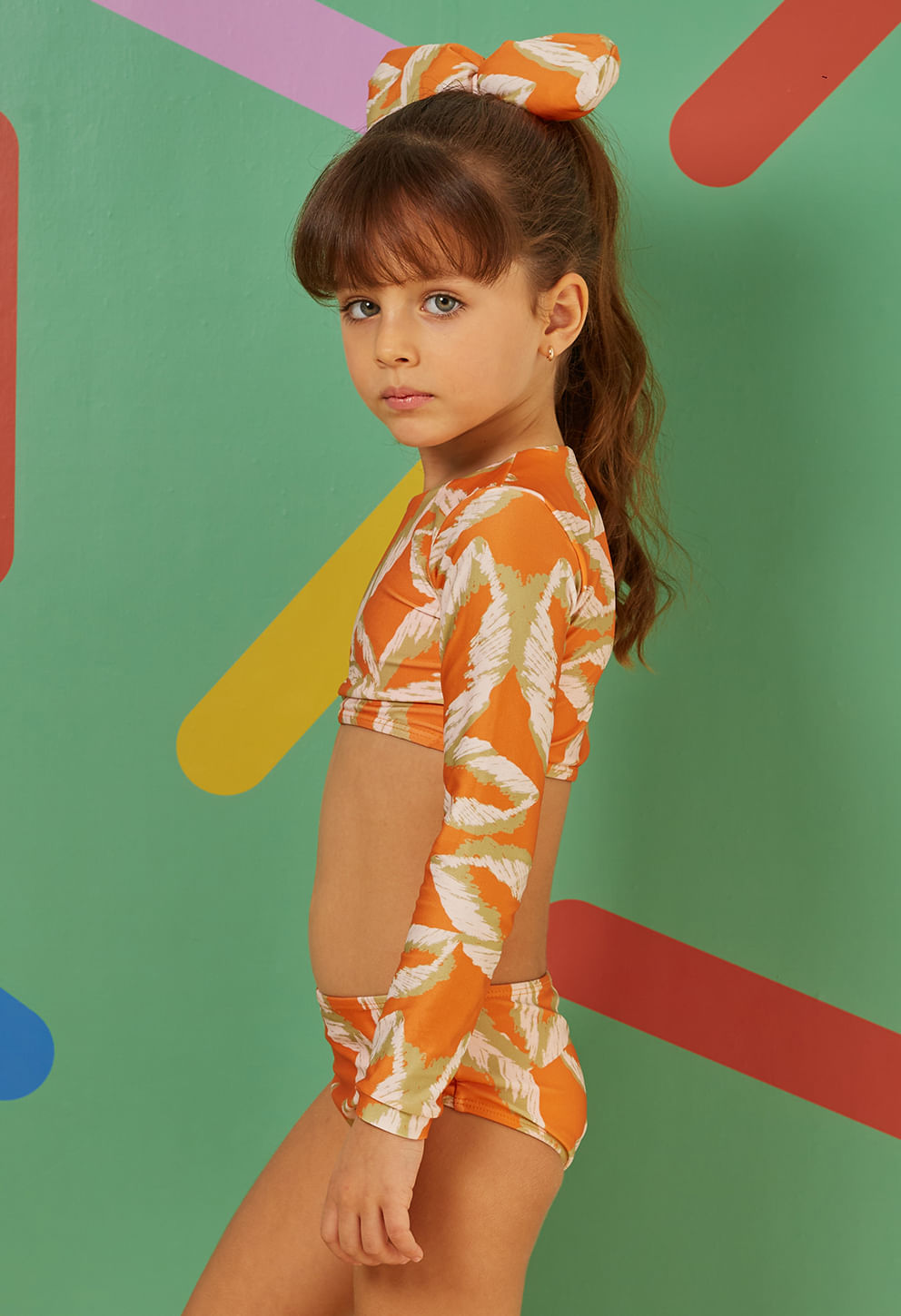 Foto lateral do biquíni infantil Luiza Estrela Do Mar laranja